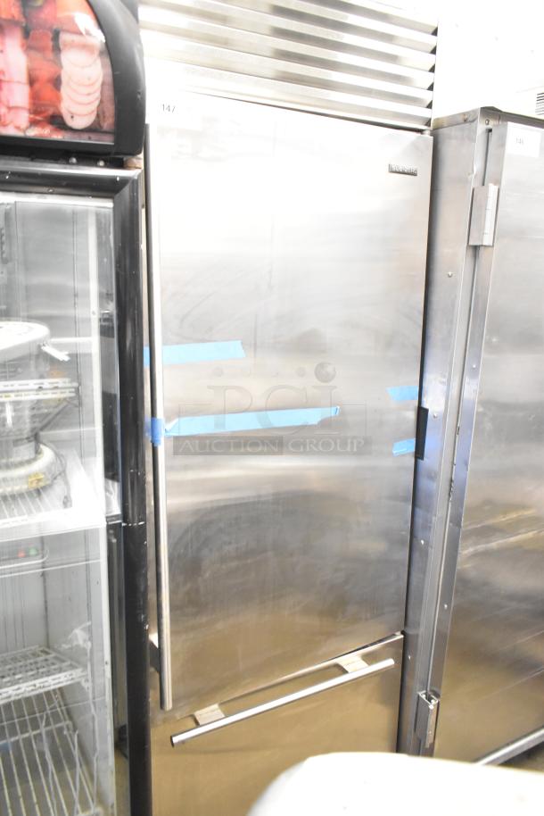 Sub Zero BI-30U/S/TH cooler with freezer drawer, stainless steel, 115V, 1-phase. Some blue tape on the door, good condition.
