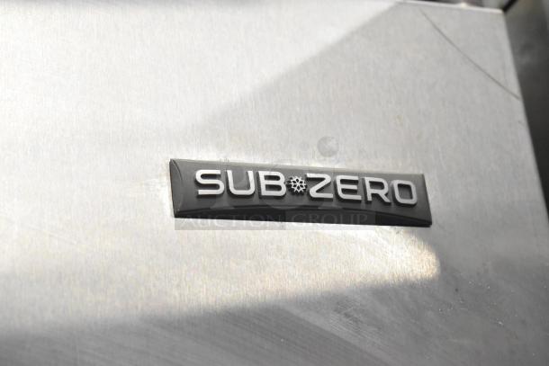 Sub Zero BI-30U/S/TH cooler with freezer drawer, logo detail. 115V, 1 phase. Stainless steel finish.