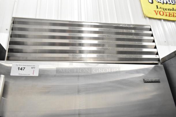 Sub Zero BI-30U/S/TH Reach In Cooler with freezer drawer. Stainless steel exterior, 115V, 1 Phase. Auction tag visible.
