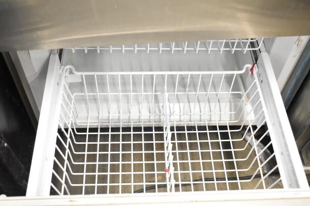 Sub Zero BI-30U/S/TH cooler with open freezer drawer, 115 Volts, 1 Phase. Wire basket interior visible, clean condition.