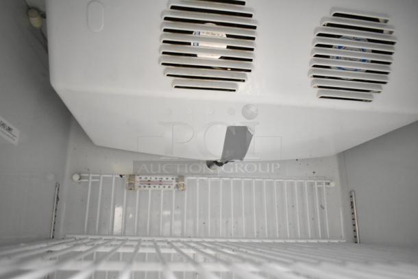 Minus Forty 22-USGF-X1-BBR commercial freezer interior, showing shelf and vents, 115 volts, single phase.