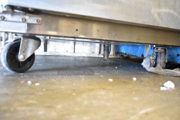 Everest ESR1 Reach In Cooler with visible commercial casters. Single door, 115V, 1 Phase, durable construction.