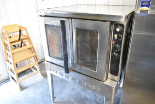 Blodgett commercial full-size convection oven with view-through doors, thermostatic controls, and metal legs in used condition.