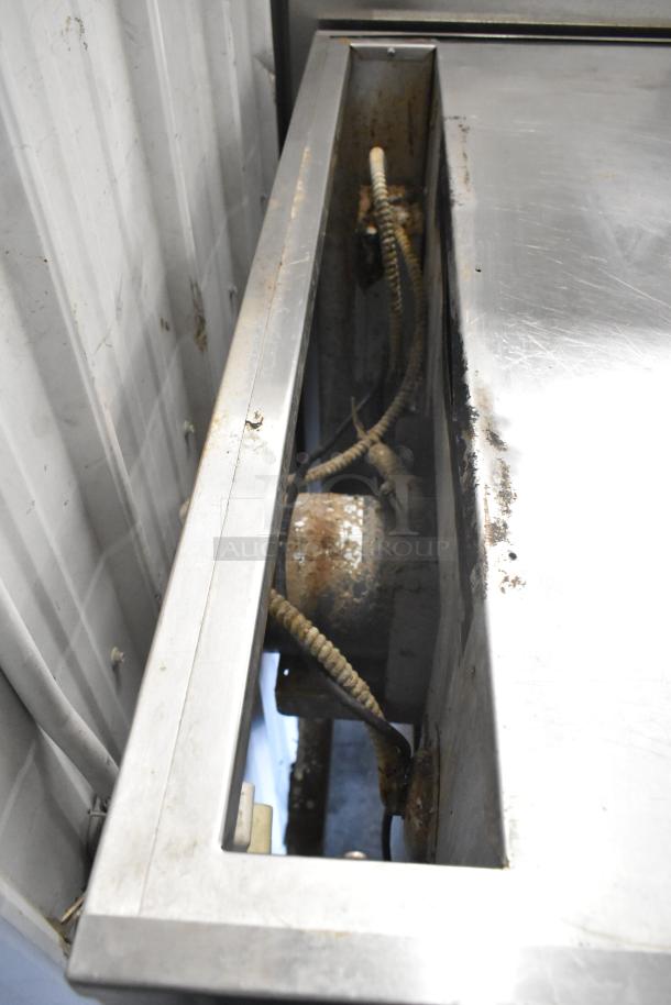 Blodgett commercial convection oven interior view, showing metal structure and wiring, highlighting its robust build quality.