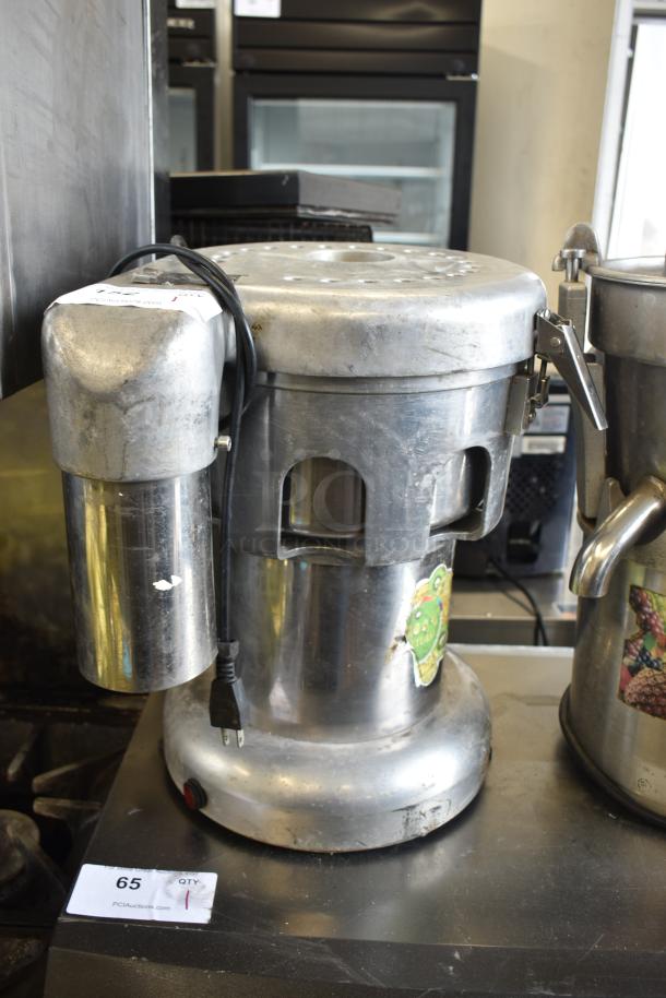 WF-A2000 countertop juicer, 110V, 1 phase, stainless steel body, visible wear. Model label reads "WF-A2000."