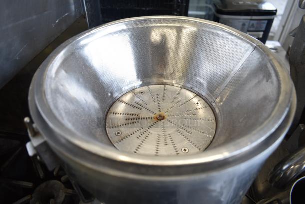 WF-A2000 Countertop Juicer, stainless steel, 110 Volts, 1 Phase. Visible metal chamber and grater insert.