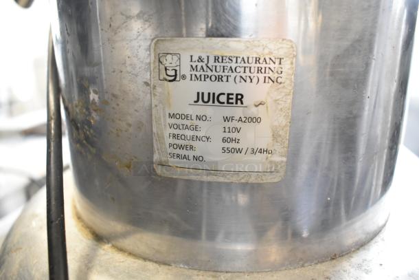 WF-A2000 Countertop Juicer by L&J; stainless steel, 110V, 550W, 60Hz; visible wear, model and voltage label included.