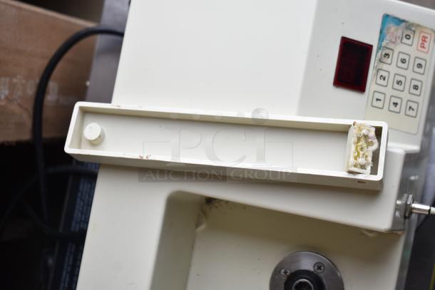 Edhard MK commercial countertop donut pastry filler base, 120 volts, 1 phase, visible keypad.