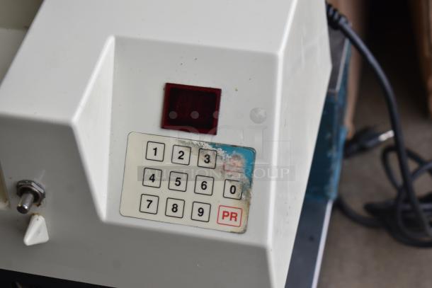 Edhard MK Commercial Donut Filler Base, keypad panel view, 120V, signs of wear, suitable for pastry filling.