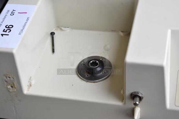 Edhard MK Commercial Donut Pastry Filler Base, 120V, 1 Phase. Visible label: "PCAuctions.com, 156." Signs of light wear.