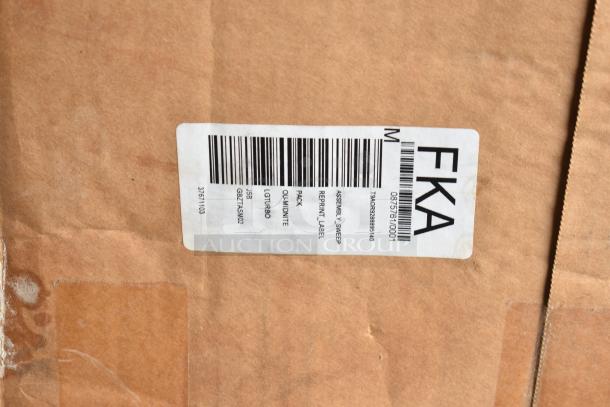 Cardboard box with a label featuring barcode and codes such as FKA and LGTURBO; auction includes various kitchen items.