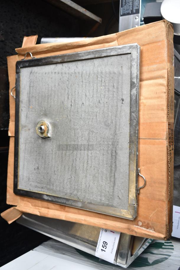 Set of 5 items including a pressure fryer basket and VitaMix blender pitchers. Features metal mesh and visible auction tags.