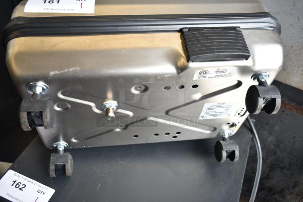 Vapor Systems VX 5000 Heating Element, 120V, 1 Phase, metal exterior, foot pedal, and wheels, model tags visible.