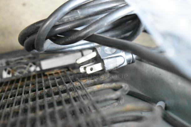 IDW G-2C Single Door Mini Cooler Merchandiser, 115V, 1 Phase, close-up of power cord and cooling system, moderate wear.