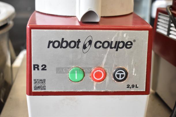 Robot Coupe R2N food processor, includes grating and S blades, 120V, slightly worn, with control panel and logo.