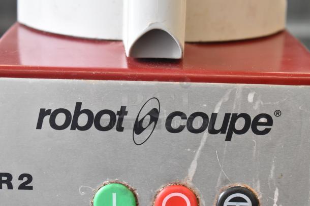 Robot Coupe R2N countertop food processor with grating and S blades. Features 120V, 1-phase power. Visible brand logo.