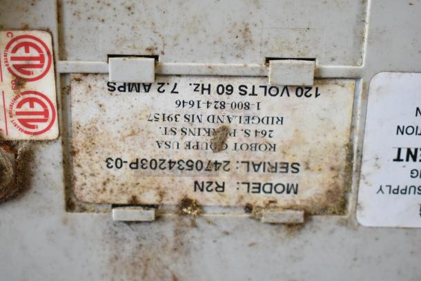 Robot Coupe R2N food processor label showing model, serial number, voltage, phase, and electrical certification marks.