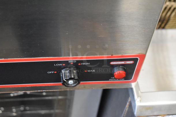 Winco FW-S500 countertop food warmer, stainless steel, temperature dial, 120 volts, 1 phase, caution hot indicator.