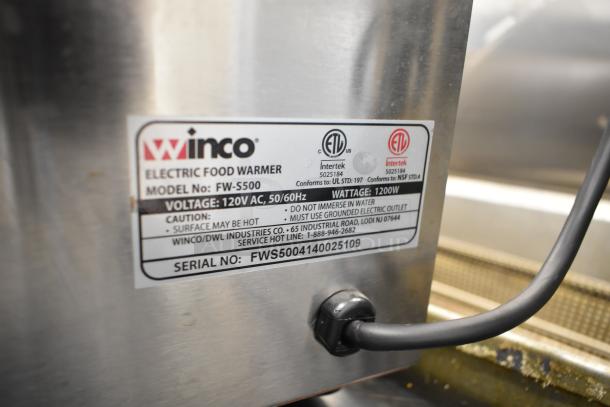 Winco FW-S500 countertop food warmer label showing model, 120V voltage, 1200W wattage, and safety instructions.