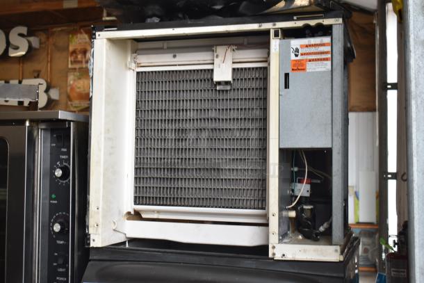 Manitowoc SY0854A commercial ice head on bin, 208-230V, 1 phase, visible controls, used condition.