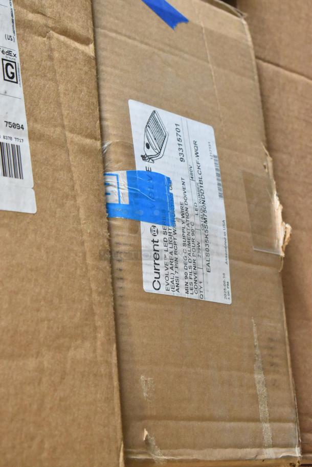 Cardboard box labeled with "Current Evolve LED Series" showing model EALS03M5SCH50NDDBLCKF-WQR, contains area lights.