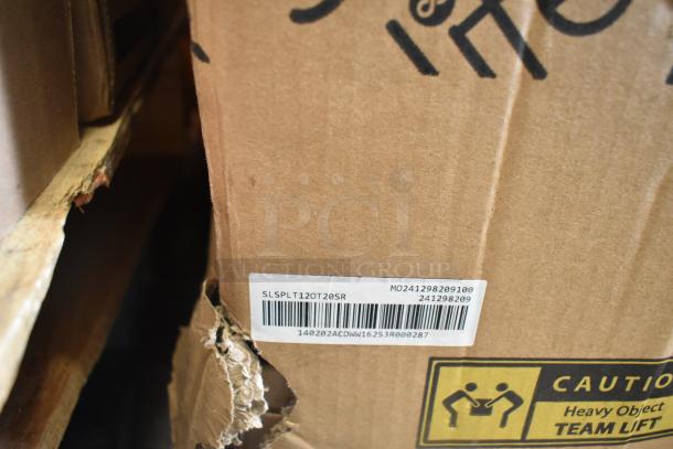 Cardboard box with SKU label reading "SLSPLT12OT20SR" and a "Caution: Heavy Object Team Lift" sticker. Packaging showing wear.