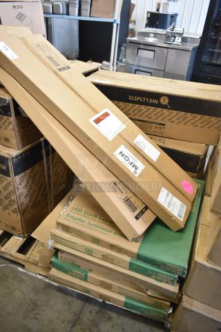 8 new scratch and dent items including Lithonia Lighting CPXR Retrofit Kit and LED Stack Lay In Troffer. Boxes labeled, unopened.