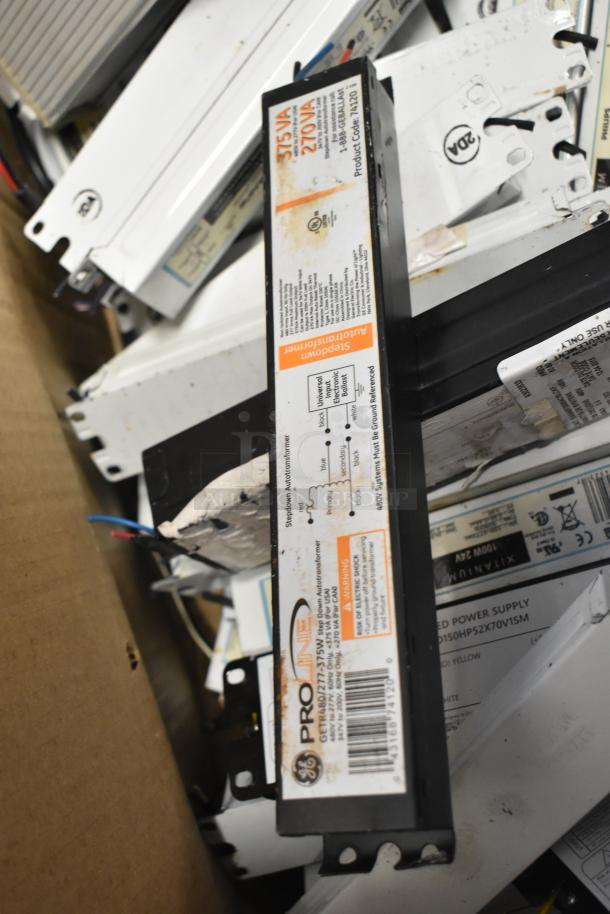 Assorted ballasts, 180 in total, GE ProLine model, visible labels indicating specifications, used condition.