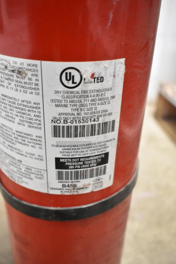 Red dry chemical fire extinguisher, UL listed, Amerex Model B456, 10 lb, Class 4-A:80-B:C, pressure tested to 585 PSI.