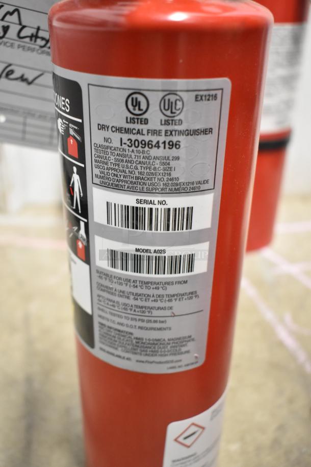 Red dry chemical fire extinguisher, UL listed, Model A0245, serial: I-30964196. Includes handling instructions. Buyer pickup only.