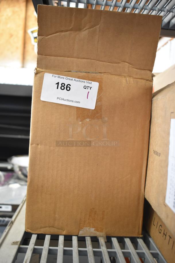 Box of 6 Alight ALG3R612L lights, brand new with scratches and dents, cardboard packaging visible, auction label "186."