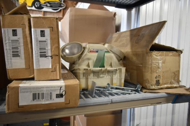 5 items including Alight 59136LE-15 Bi Pin Light, Lithonia Lighting, Dual Lite LMW401-FX Emergency Light; boxes and packaging visible.