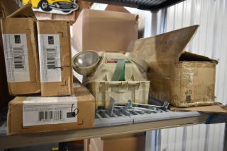 5 items including Alight 59136LE-15 Bi Pin Light, Lithonia Lighting, Dual Lite LMW401-FX Emergency Light; boxes and packaging visible.