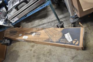 Bruised box of Lithonia Lighting VAP 6000LM PCL MD MVOLt Light; scratches; labeled "BAD."