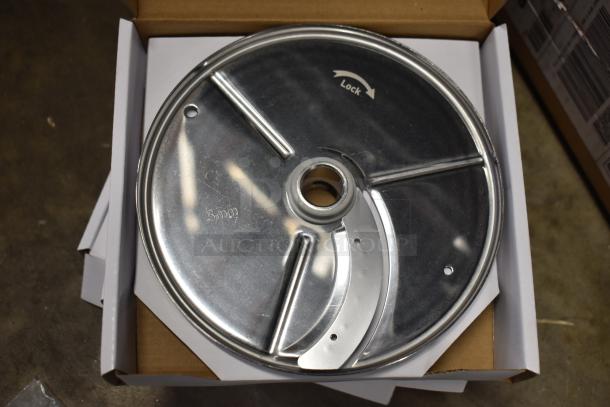 Three new slicing and grating blades, minor scratches and dents, 3mm marking, metal construction, boxed for auction.