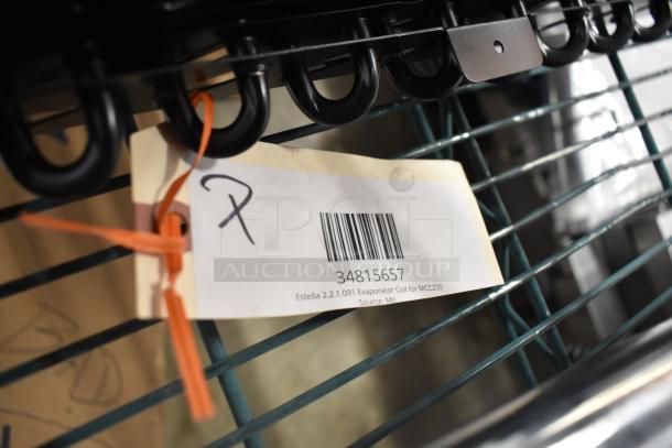 BRAND NEW SCRATCH AND DENT Estella 34815657 Evaporator Coil for MCC220 with barcode tag indicating model and source.