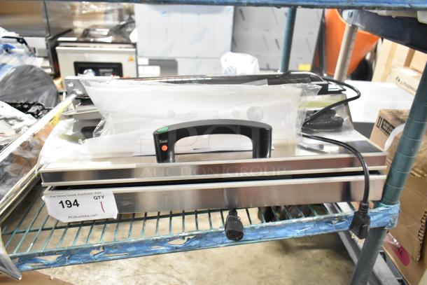 Brand new VacPak-It 186UVME16SS vacuum packing machine with 16" seal bar, roll cutter, dual piston dry pump. Scratch and dent condition.