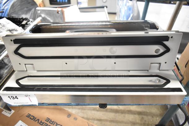 VacPak-It Ultima UVME16SS vacuum packing machine, 16" seal bar, roll cutter, dual piston dry pump. New, scratch and dent condition.