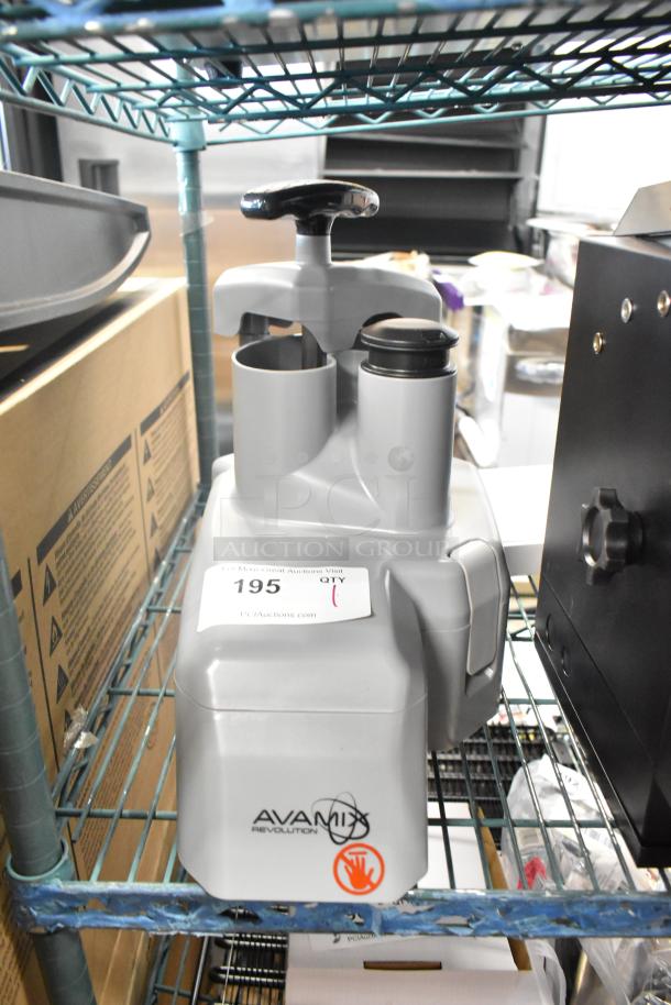 Brand new AvaMix 928REVCFEED continuous feed attachment, Revolution series. Grey with manufacturer's logo, slight dents visible.