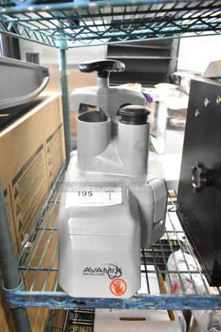 Brand new AvaMix 928REVCFEED continuous feed attachment, Revolution series. Grey with manufacturer's logo, slight dents visible.