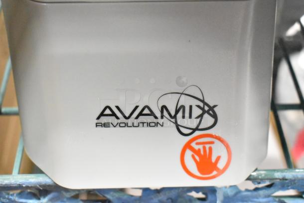 BRAND NEW scratch and dent AvaMix 928REVCFEED continuous feed attachment for Revolution Series, with logo and safety warning visible.