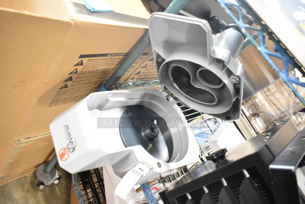 BRAND NEW AvaMix 928REVCFEED Continuous Feed Attachment for Revolution Series, slight scratches, visible AvaMix logo.