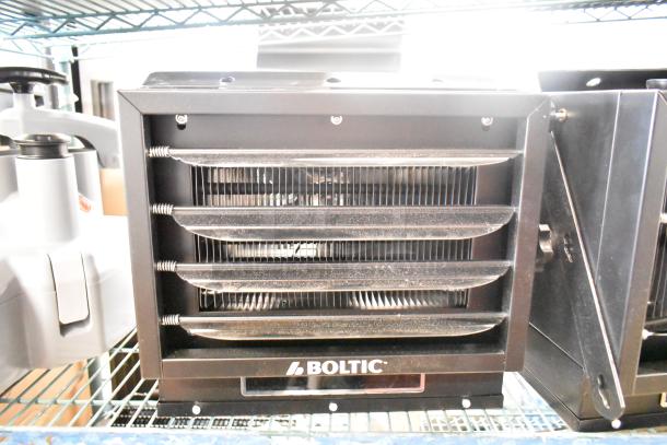 2 Brand New Boltic VF-7500 electric heaters, ceiling-mounted, 240V, scratch and dent condition, model visible on the unit.