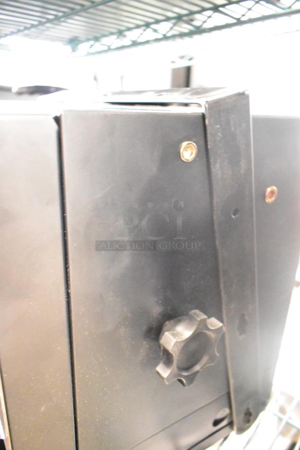 2 Boltic VF-7500 Electric Garage Heaters, ceiling-mounted, 240V, new with minor scratches, black finish.