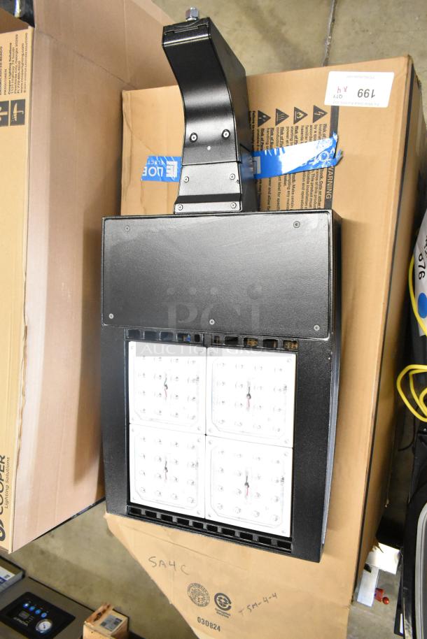 Brand new Cooper Lighting fixture, scratch, and dent condition, sealed box. Visible labels indicate model and safety info.