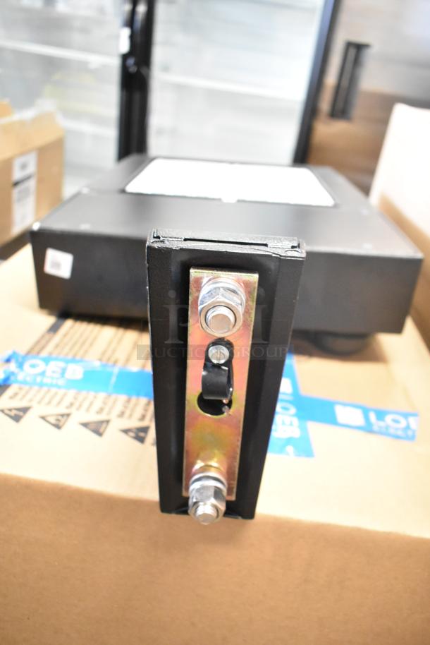 4 Cooper Lighting fixtures, new condition with minor scratches. Image shows close-up of metal bracket and bolts.