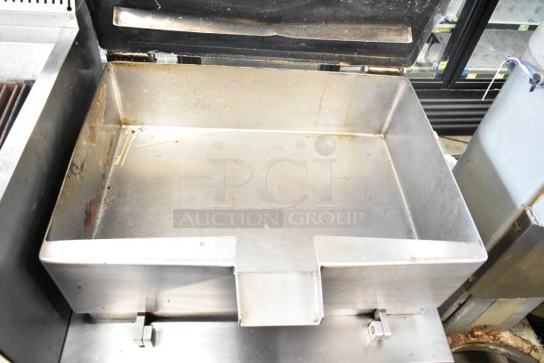 Vulcan Commercial Floor Braising Pan, stainless steel, visible wear, spacious interior, sturdy construction.