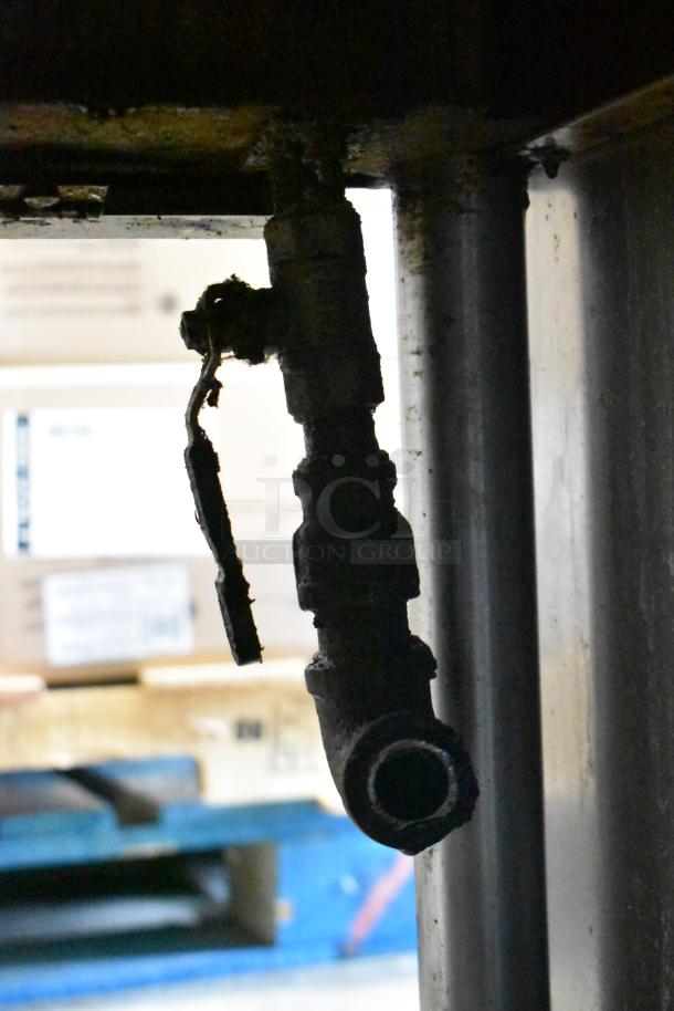 Vulcan Commercial Floor Style Braising Pan valve detail. Shows wear, suggesting frequent use or age.