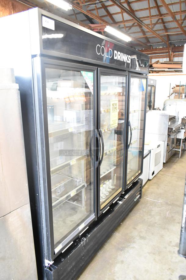 2017 True GDM-72-HC commercial 3-door reach-in cooler. Black exterior, glass doors, 115V, 1 phase, "Cold Drinks" signage.