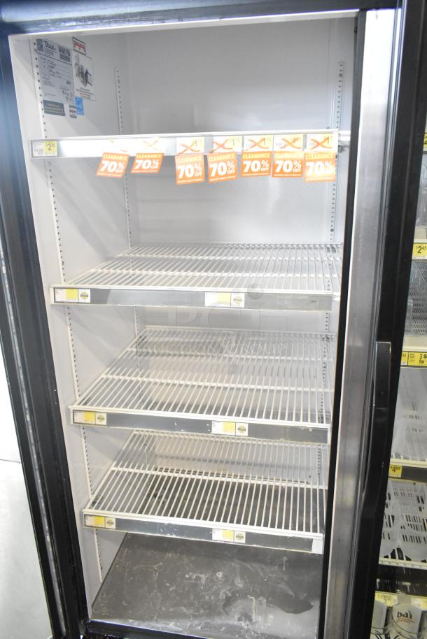 2017 True GDM-72-HC 3 Door Reach In Cooler Merchandiser; 115 Volts, 1 Phase; clean condition, shelving intact.